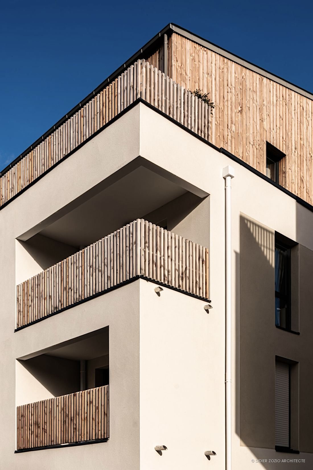 Bobourg - détail angle, attique bardage bois et balcons